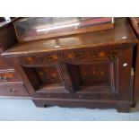 18th / 19th Century Flemish oak and marquetry inlaid coffer, the hinged lid above a two panel