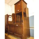 Mid 20th Century oak hall bench with carved back, hinged cover and plank seat above a two panel