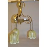Arts and Crafts brass three branch hanging light fitting in Benson style with three green Vaseline