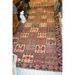 Baktiari style rug with all-over panel design in shades of red, ivory and blue, 118ins x 60ins