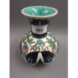 Burmantoft baluster form vase decorated in Iznik, impressed marks and painted mark L.K. for