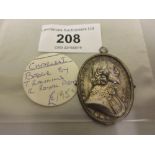 Rawlins silver Royalist badge, profile bust of Charles I, the obverse with Royal coat of arms
