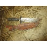Horn handled dagger with leather scabbard