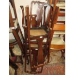 Set of four 20th Century mahogany Queen Anne style dining chairs having floral upholstered drop-in