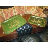 Two 19th Century rectangular green papier mache trays painted with lillies