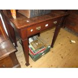 Small early 20th Century mahogany writing table with single frieze drawer raised on square