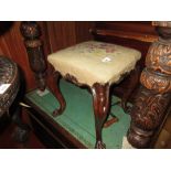 Victorian walnut stool with a square needlepoint upholstered seat on cabriole supports with carved