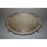 Victorian silver salver with shaped bead pattern rim, the centre panel engraved with floral swags