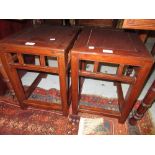 Pair of Chinese low rectangular lamp tables on square supports with peripheral stretchers, 18ins