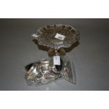 Birmingham silver small pedestal comport, four piece silver condiment set, pair of silver shell form