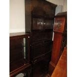 Mahogany Globe Wernicke type five section glazed and panel door bookcase (at fault)