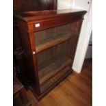 Mahogany four shelf dwarf open bookcase with plinth base