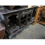 19th Century mahogany credenza having mirrored single shelf back on turned supports with bevelled