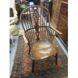 Pair of 19th Century yew wood elm seated wheel and stick back Windsor armchairs with turned supports