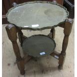 Early 20th Century oak and brass two tier occasional table