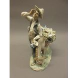 Lladro porcelain group of a man and his horse laden with ceramics, 10.25ins high