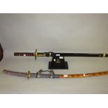 Two replica Samurai Katana with scabbards