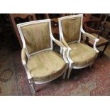 Pair of late 19th or early 20th Century French white painted and upholstered open armchairs on