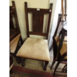 Set of four reproduction oak dining chairs with Gothic style backs