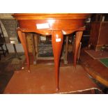 Pair of reproduction half round side tables on cabriole supports