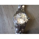 Raymond Weil, polished steel cased wristwatch having silvered dial with Roman numerals and date