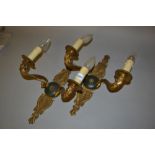 Pair of French ormolu two branch wall lights of Regence design