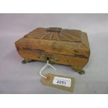 Regency leather covered jewellery casket, the shaped dome top with gilt tooled leather on low gilt