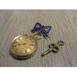 Ladies 14ct yellow gold cased fob watch with enamel bow surmount on gilt metal, including winding
