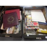 Two boxes containing a collection of World stamps