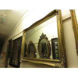 20th Century rectangular gilt framed wall mirror with bevelled plate, together with another