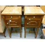 Pair of late 19th or early 20th Century Continental walnut bedside cabinets, each with an inset