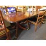 Reproduction mahogany twin pillar D-end dining table with single extra leaf raised on turned