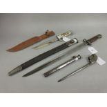 World War I bayonet, marked Wilkinson 1907, in leather and metal scabbard, a spike bayonet with