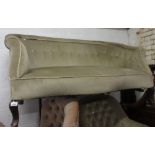 Late 19th / early 20th Century green button upholstered two seat sofa, raised on low cabriole