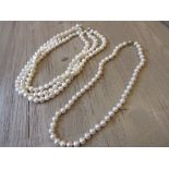 Three row cultured pearl necklace together with a single row cultured pearl necklace with 9ct gold