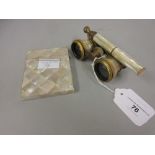 Pair of 19th Century French gilt metal and mother of pearl opera glasses with telescopic handle,