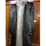 Ladies three quarter length dark brown fur coat with fox fur trim 60cm from underarm