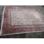 Sparta rug with an all-over floral design on an ivory ground with borders, 10ft x 7ft approximately