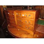Pair of reproduction yew wood three drawer bedroom chests, a reproduction mahogany open bookcase and