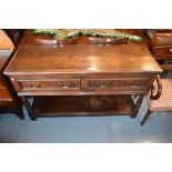 Good quality reproduction oak dresser base, the moulded top above two drawers, raised on baluster