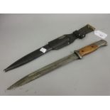German bayonet with scabbard, the 9.5in blade inscribed 44ASW