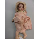 Armand Marseille bisque headed doll, with sleeping eyes, open mouth and four teeth, the head