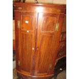 George III mahogany and inlaid bow front hanging corner cabinet