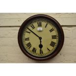 Late 19th or early 20th Century dial clock, the stained circular case enclosing a 12in painted dial,