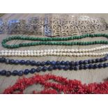 Ladies silver plated dress belt and various necklaces including: coral, lapis lazuli, malachite