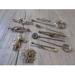 Two circular 9ct gold brooches, three various 9ct gold bar brooches, two other bar brooches, four