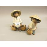 Two Lladro matt glazed figures of orientals