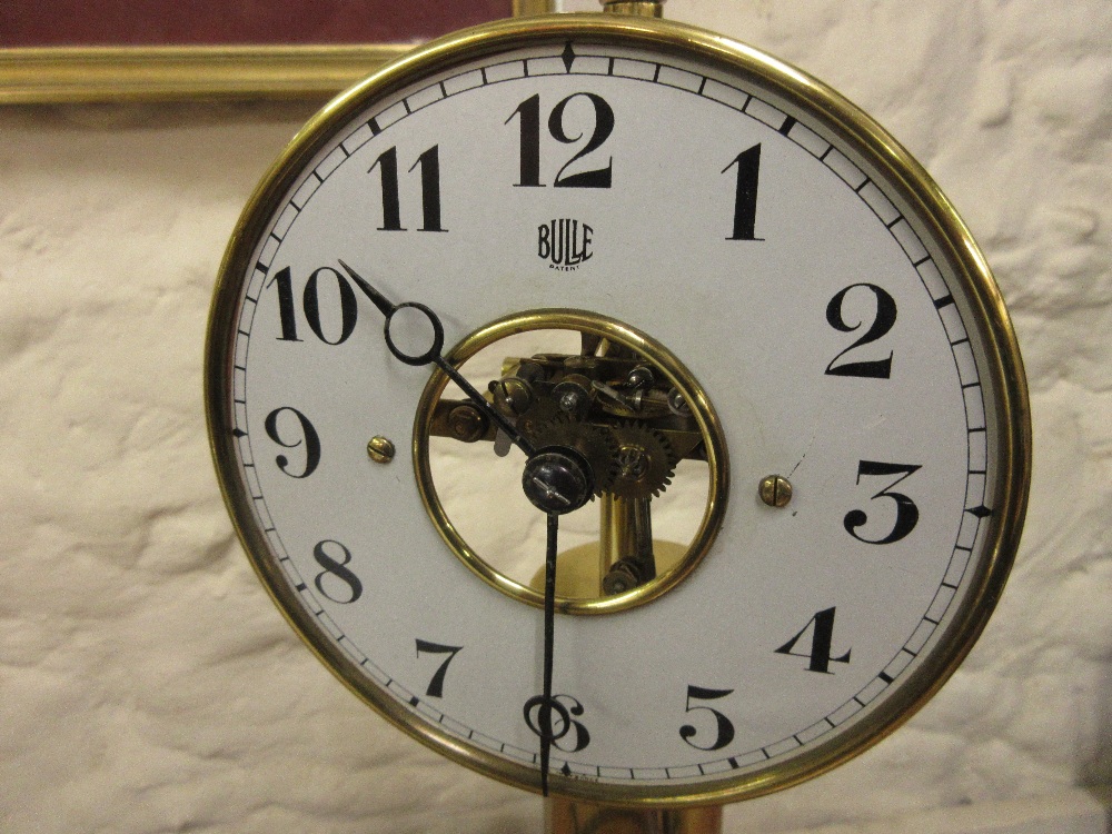 Bulle electric mantel clock, the painted dial with Arabic numerals and visible escapement on a brass - Image 2 of 9