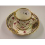 18th Century Sevres porcelain cabinet cup and saucer painted with an oval panel with centre rose and