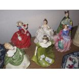 Group of six Royal Doulton figures including ' Autumn Breezes ', ' Blithe Morning ' and others